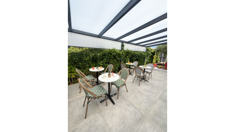 Table ronde de jardin BISTRO (diam. 60 cm) en acier noir et plateau terrazzo - BLANC